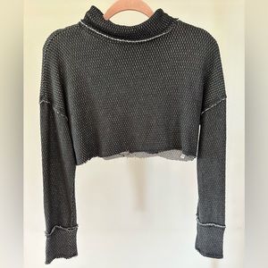 Out from under cropped turtle neck
